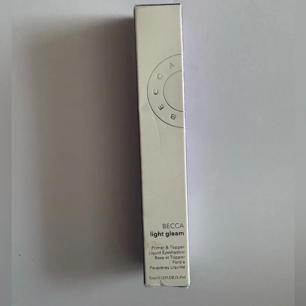 NWT becca light gleam liquid eye shadow primer and topper in shade laser